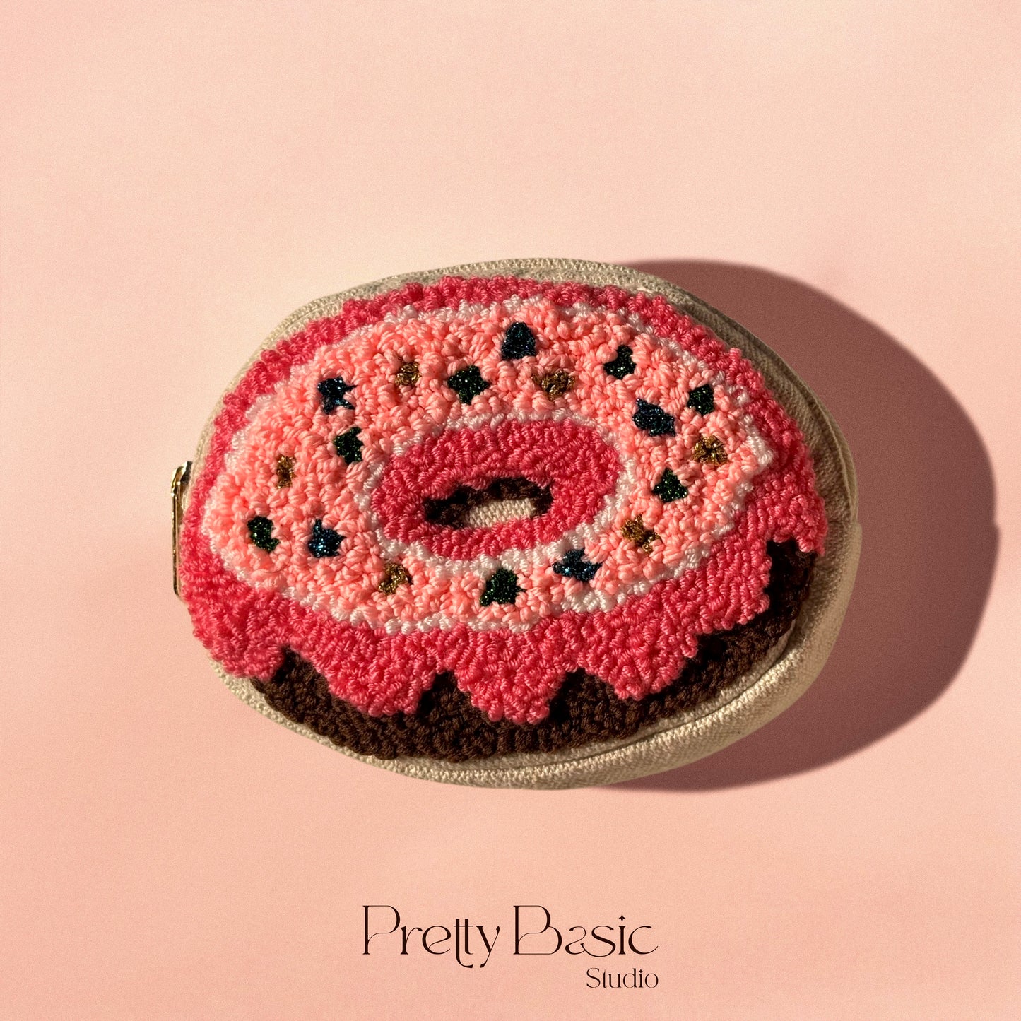 Donut hand tufted pouch