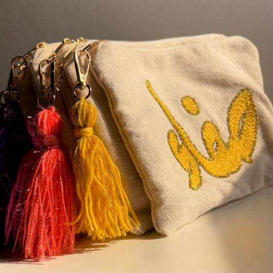 “Her keepsake” hand tufted clutch