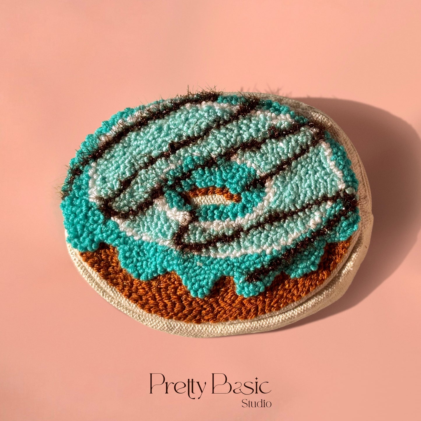 Donut hand tufted pouch