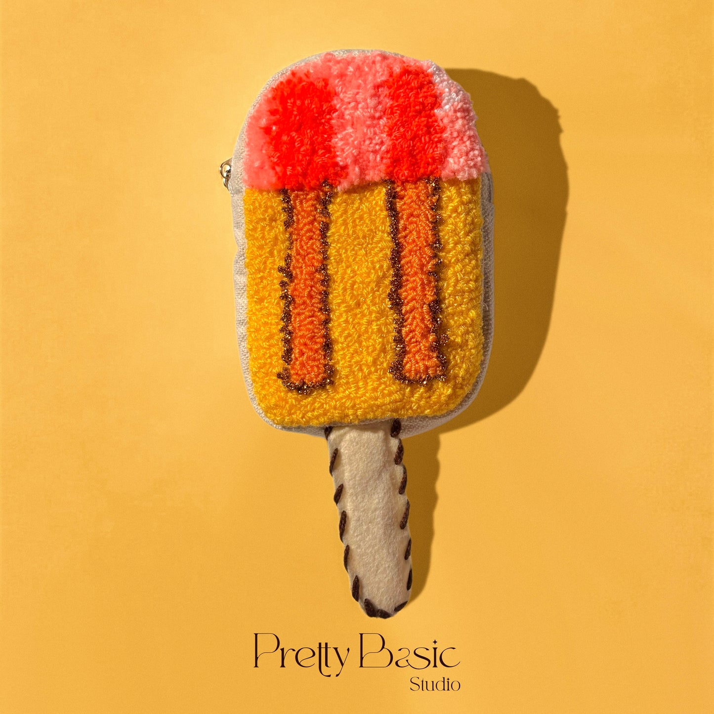 Icecream stick hand tufted pouch