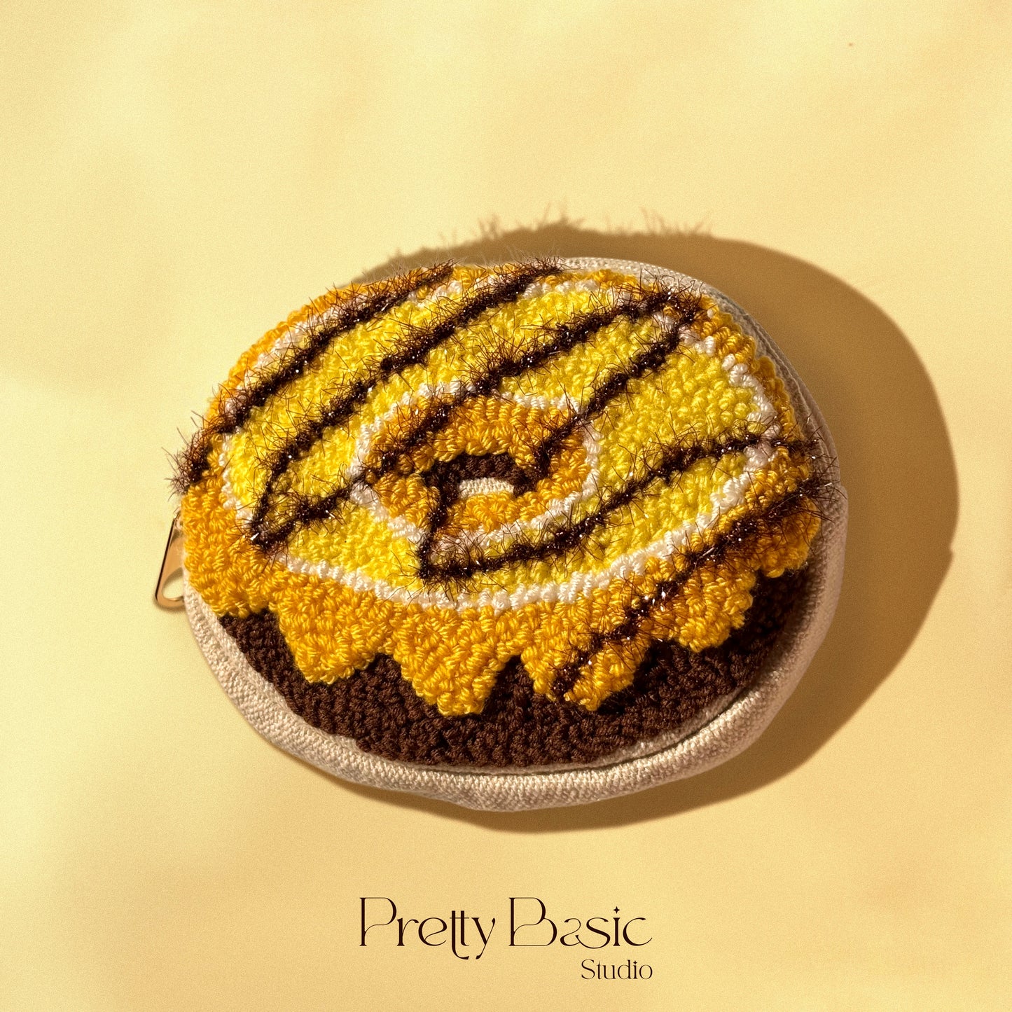 Donut hand tufted pouch