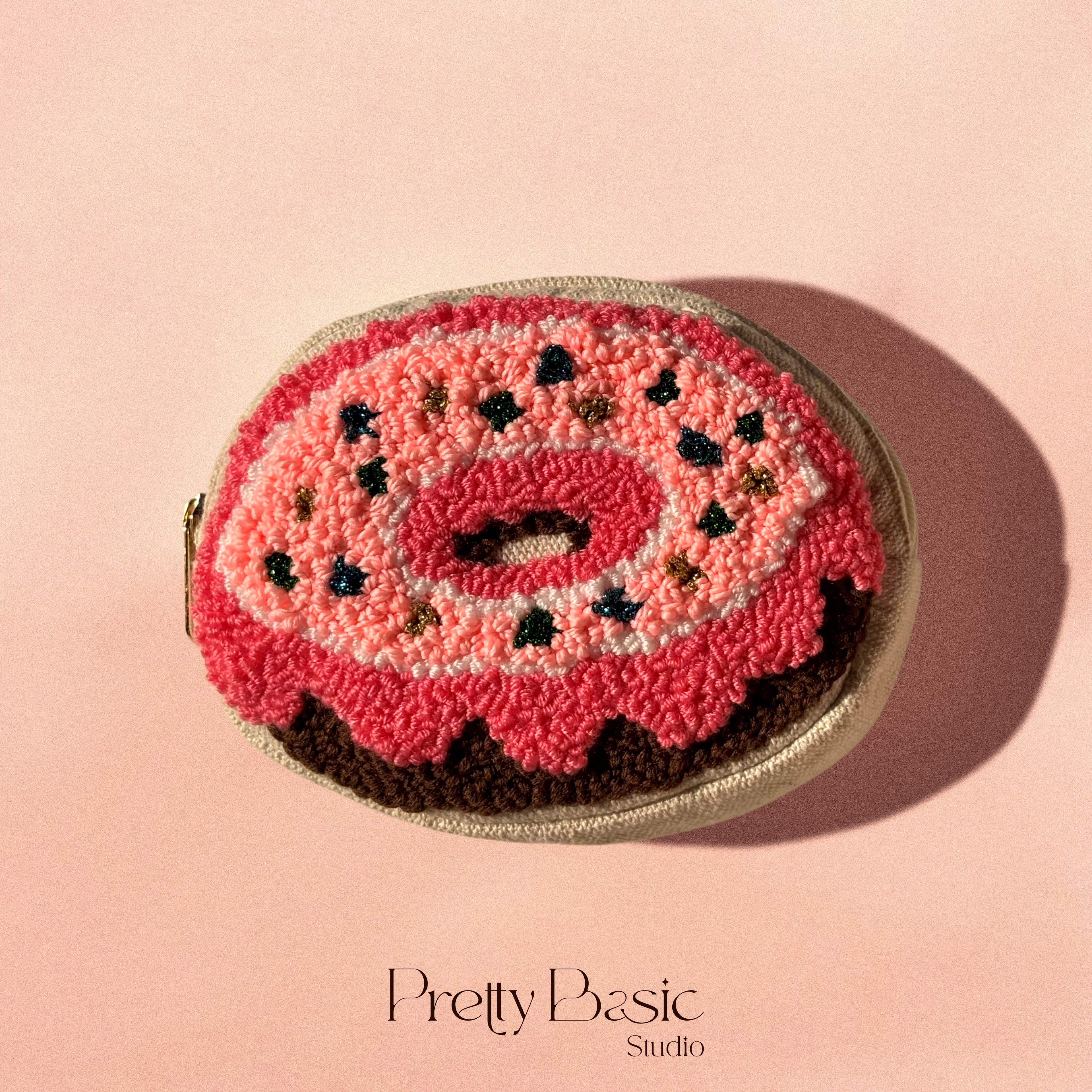 Donut hand tufted pouch