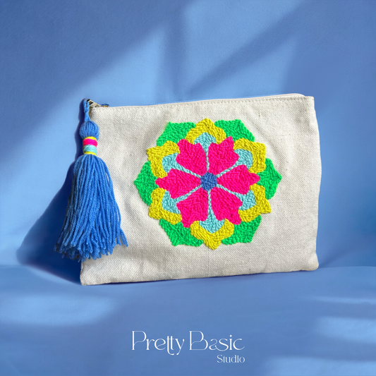 Neon flower hand tufted clutch