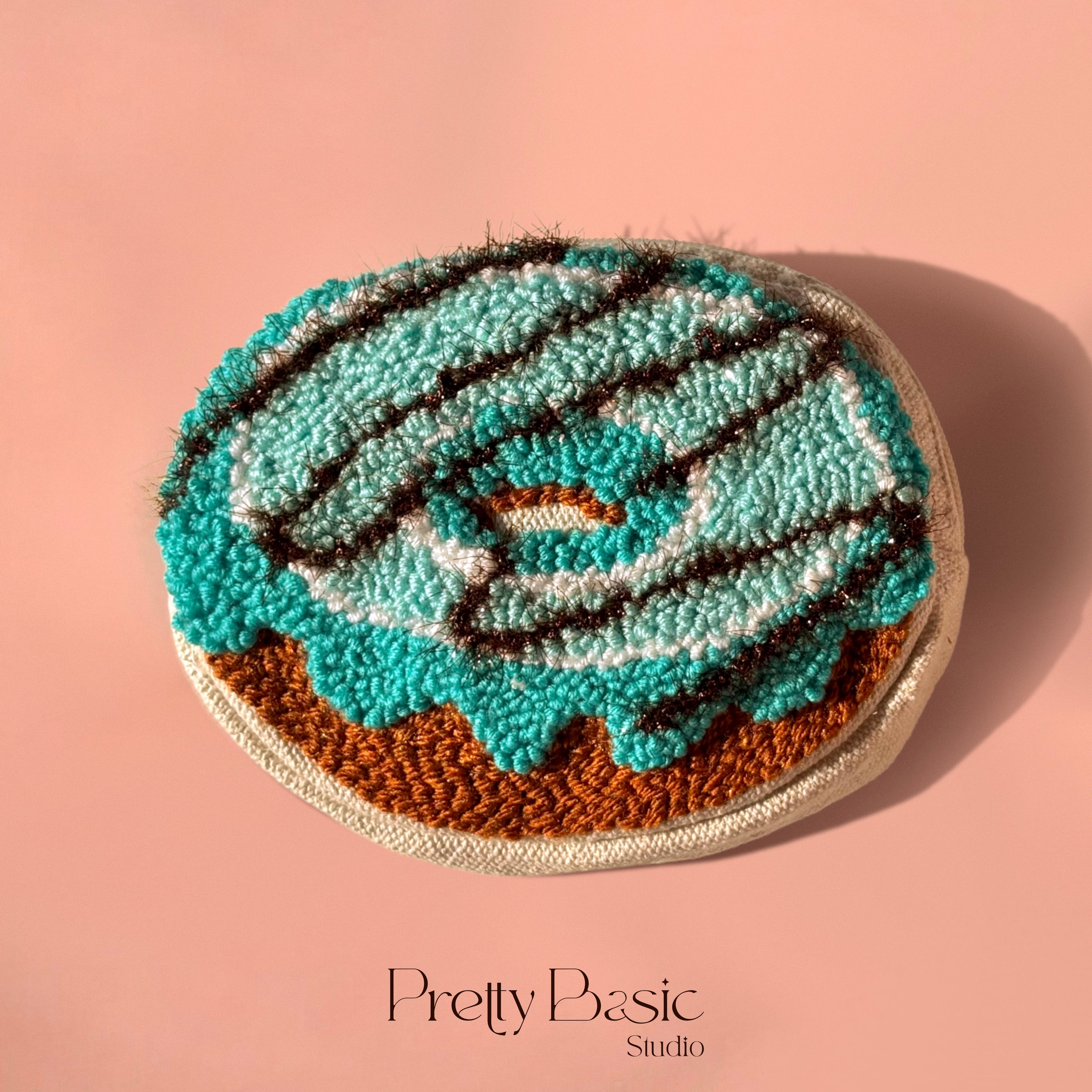 Donut hand tufted pouch