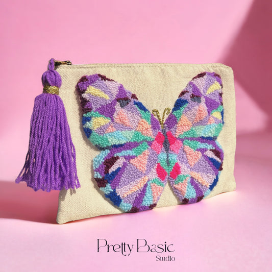 Butterfly hand tufted clutch