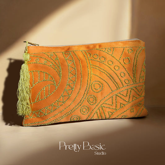 Gold twirls Hand Tufted Clutch