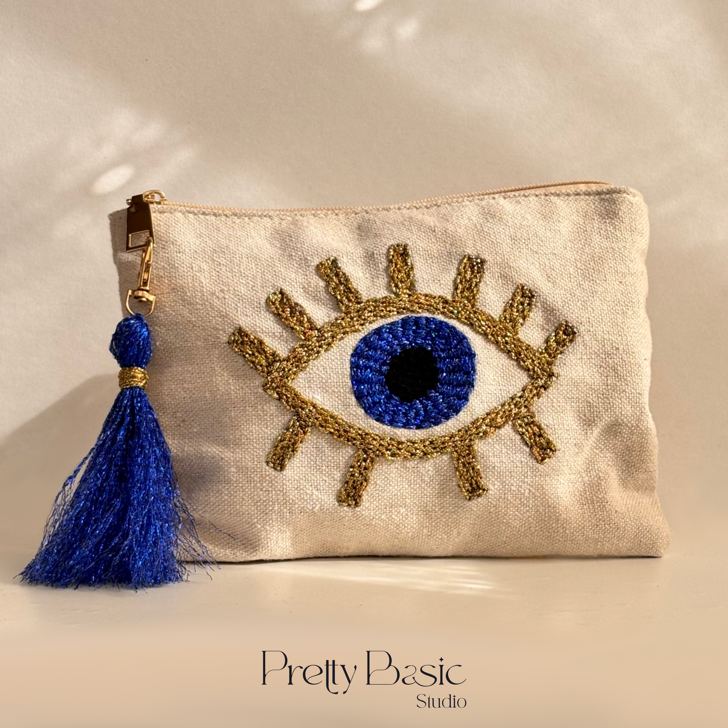 Blue eye Hand Tufted Clutch