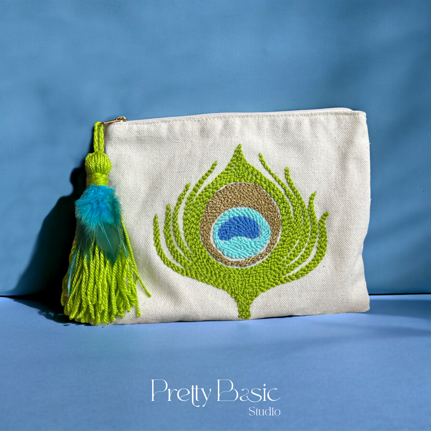 Peacock hand tufted clutch