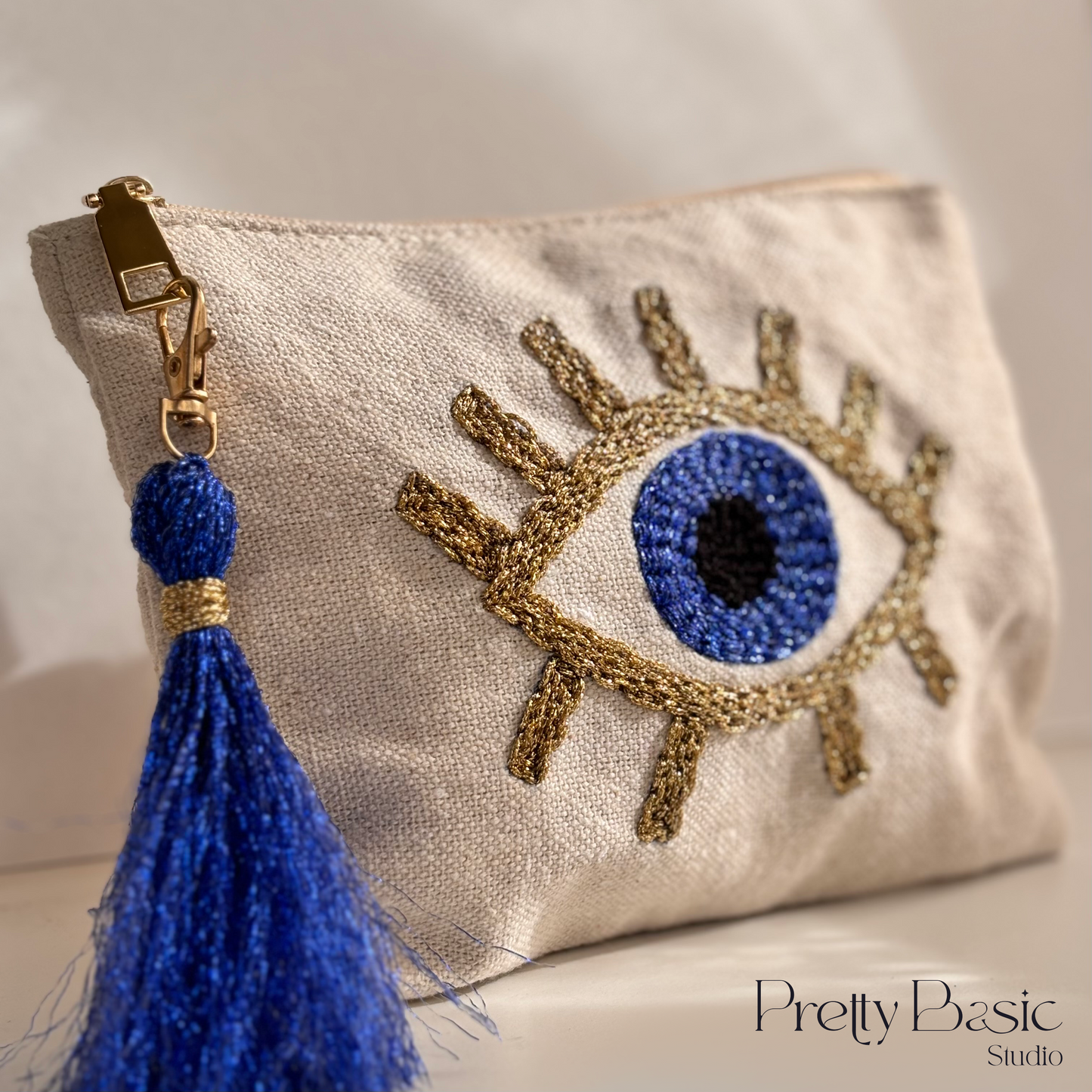 Blue eye Hand Tufted Clutch