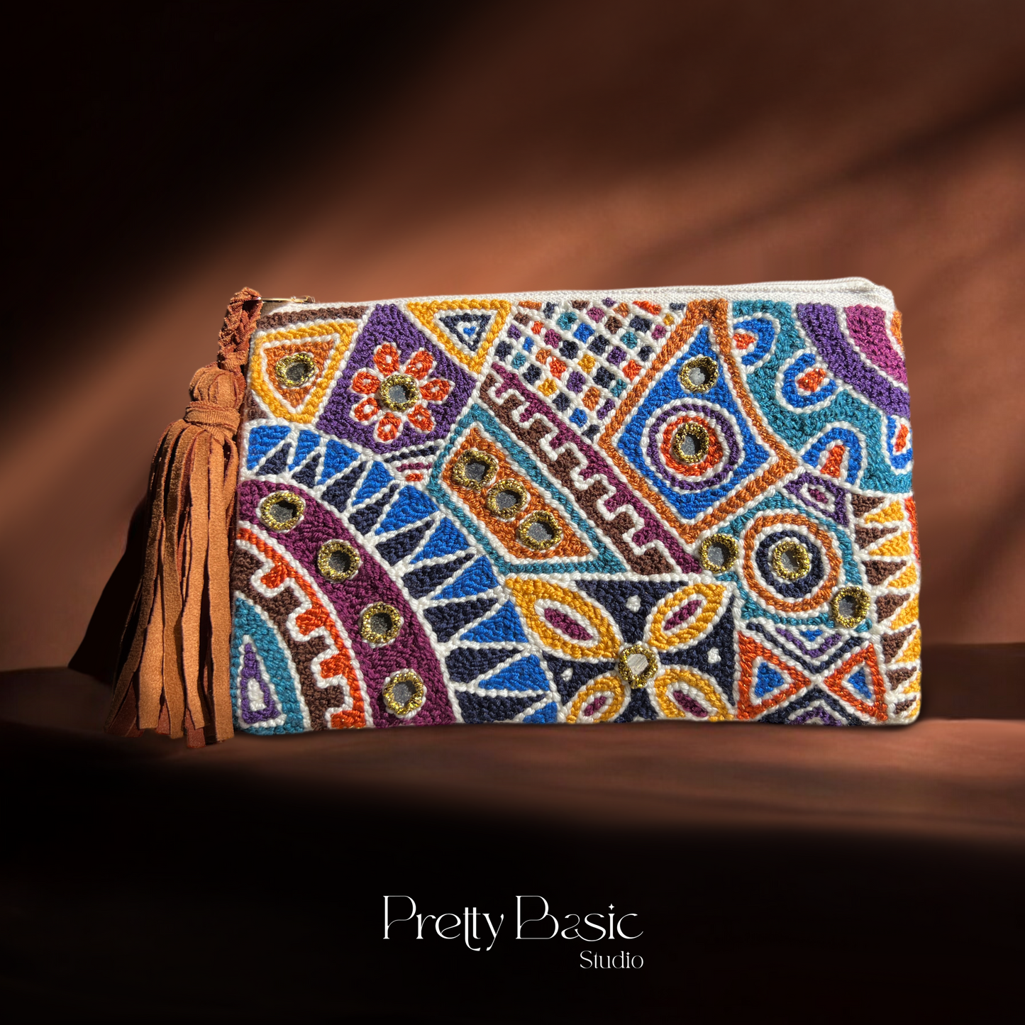 Africano hand tufted clutch