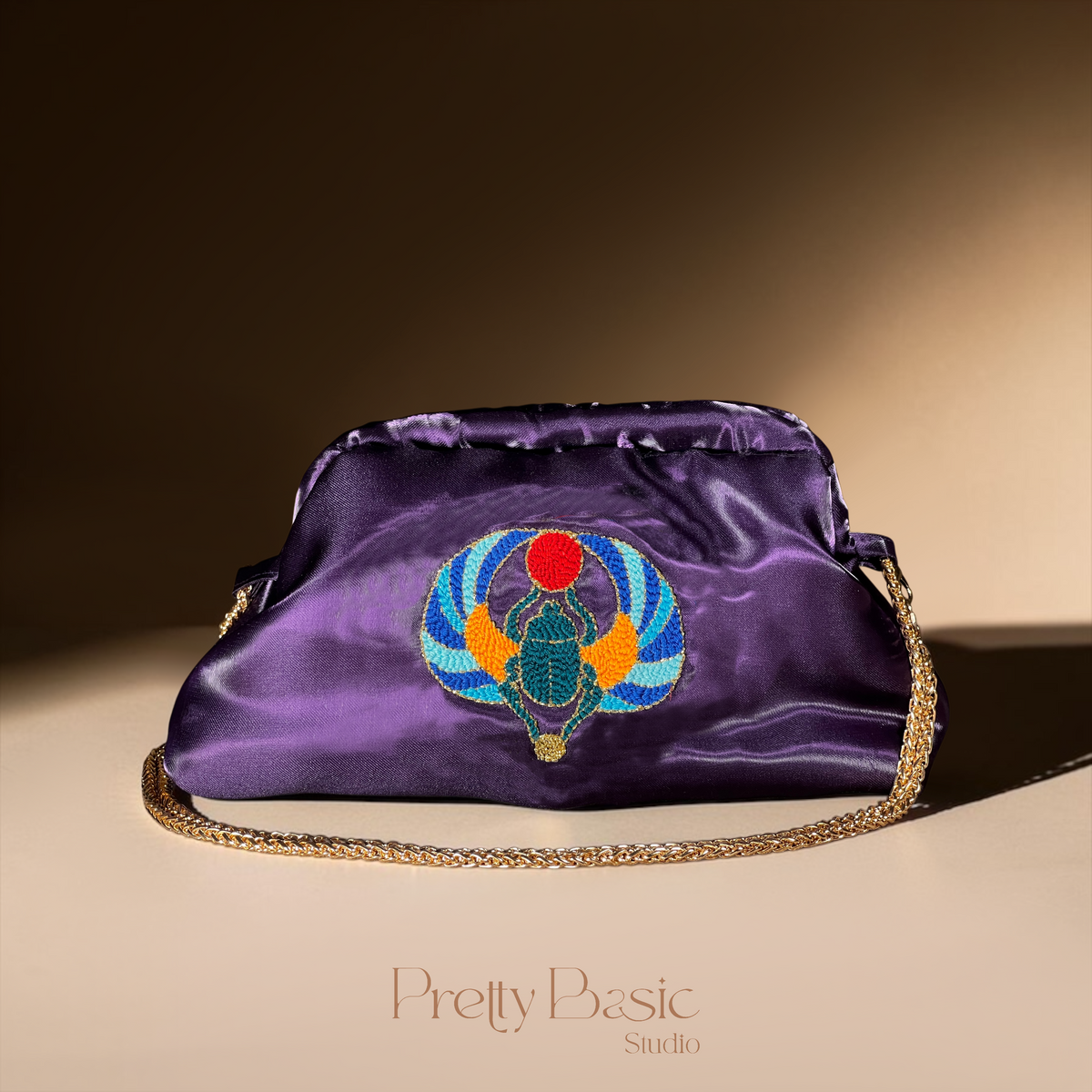 Scarab Royale Clutch