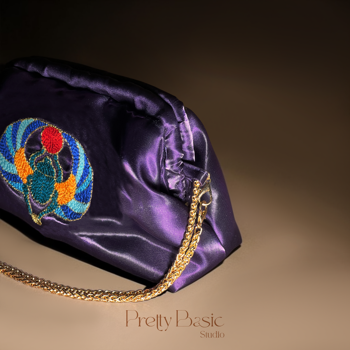 Scarab Royale Clutch