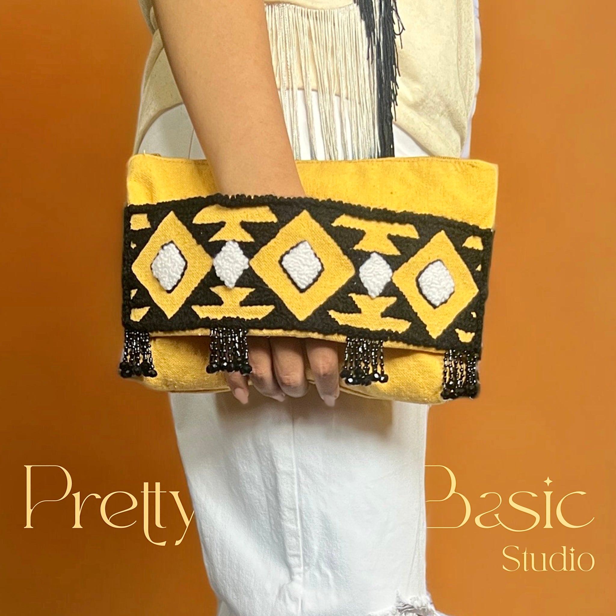 Beaded yellow Hand Tufted clutch