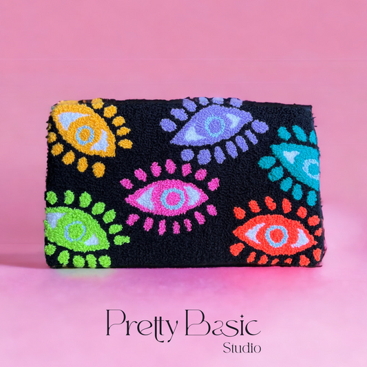 Neon eyes Hand-Tufted Clutch